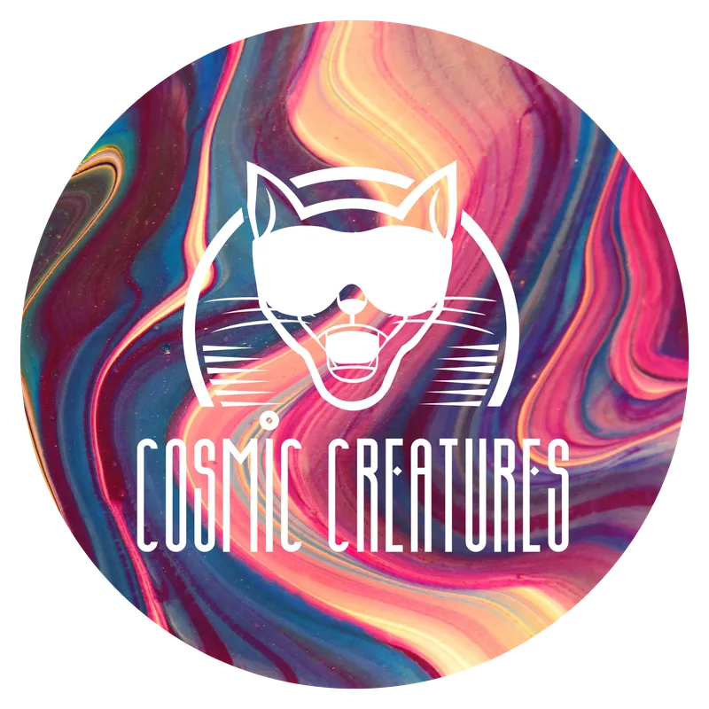 Cosmic Creatures cat logo over a swirling pink, orange and teal marbled background